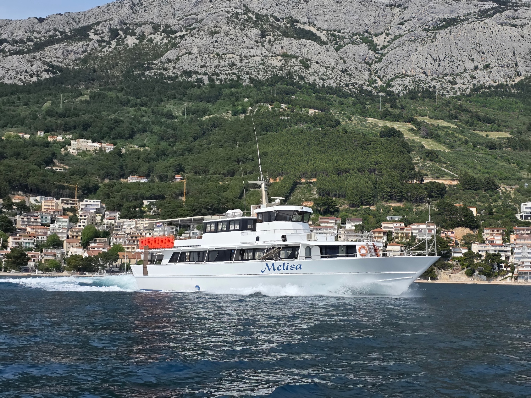 Melisa boat in front of the Biokovo mountains